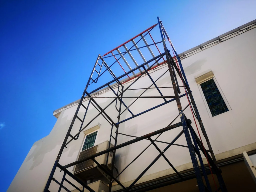 Tall scaffolding tower for exterior building maintenance and repairs in Downey CA by Downey Scaffolding Rental