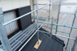 Scaffolding platform setup on residential roof for exterior work in Downey CA by Downey Scaffolding Rental