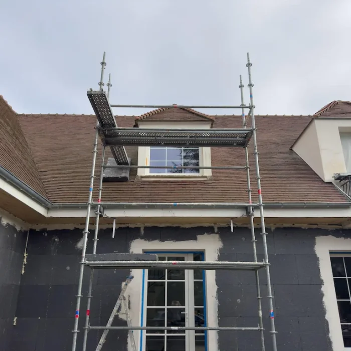 Scaffolding installed on house roof for repair and painting work in Downey CA by Downey Scaffolding Rental